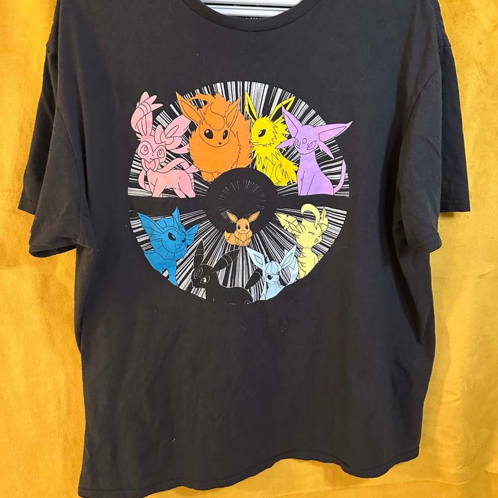 Hybrid & Company Black Tee with Vibrant Character Graphics